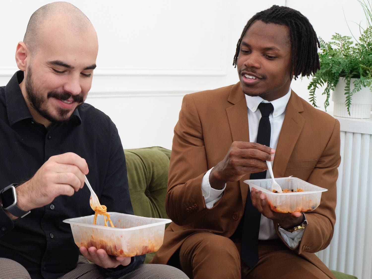 Colleagues eating together at work