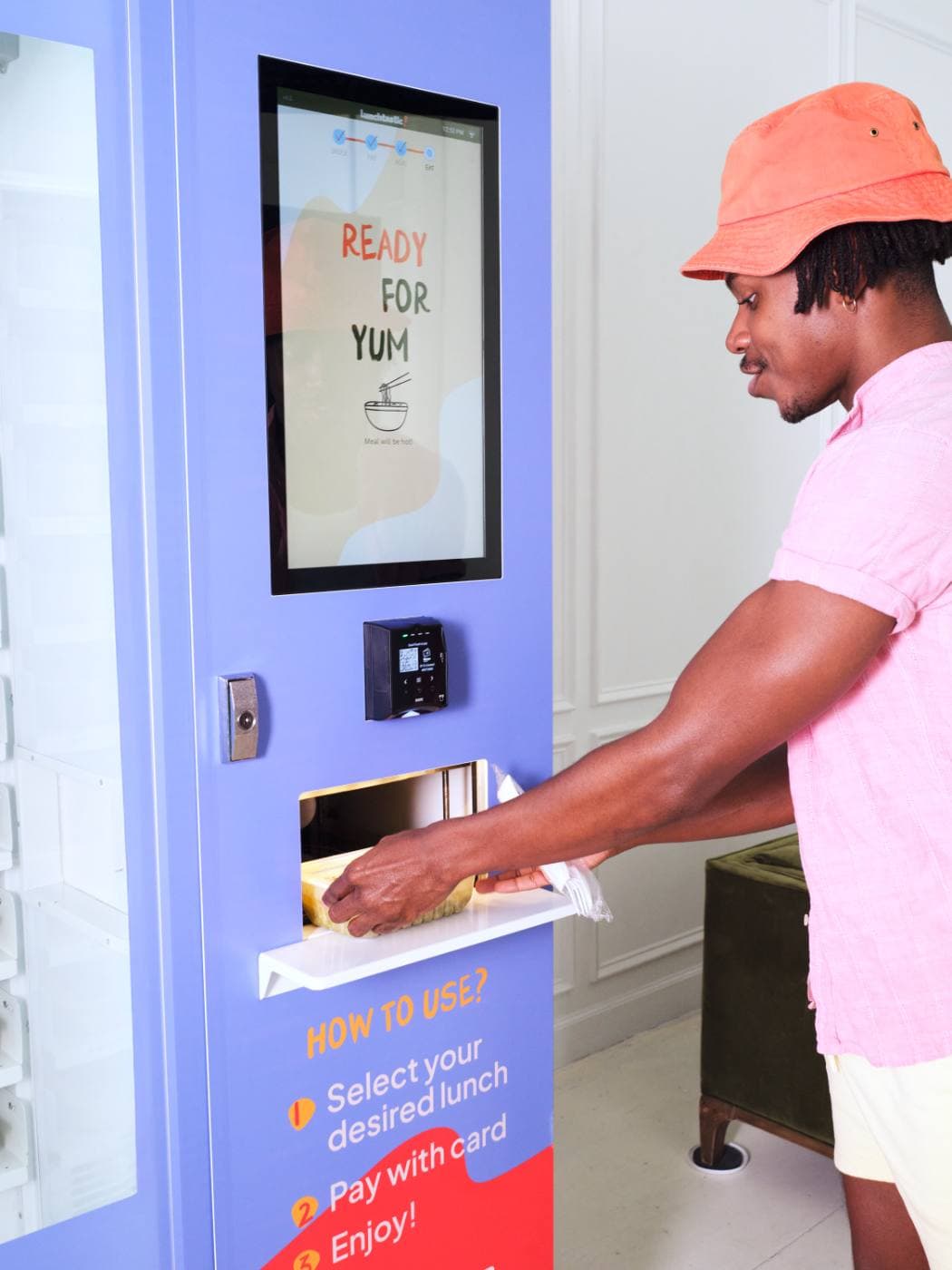 An employee collecting a meal